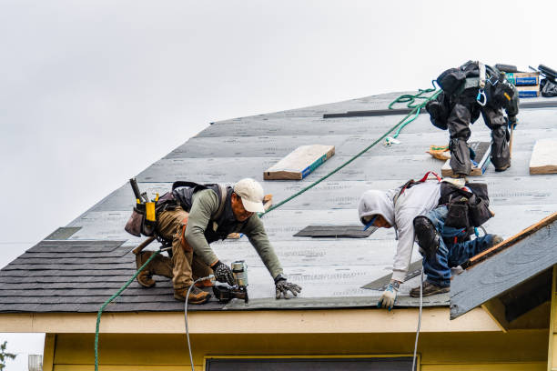Professional Flat Roof Repair technician working in Raynham Center, MA